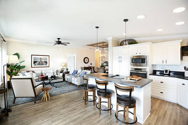 Rexmere Luxury Series kitchen with stainless steel appliances, airy, open concept kitchen and living space