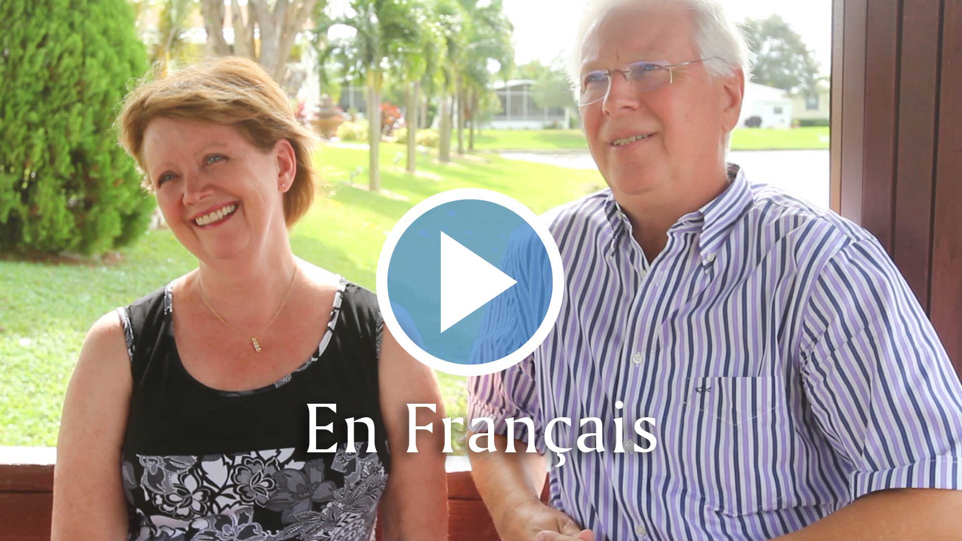 Play button for a video in which Rexmere Village residents Renee and Carmen talk in French about why they love living here.