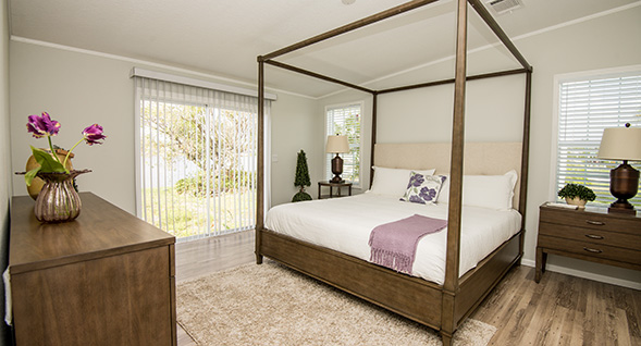 Gorgeous soothing masterbedroom with en suite bath and stunning lake views