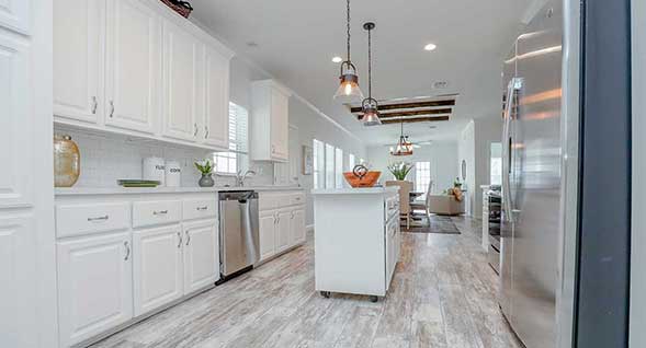 Gorgeous open concept kitchen features high end appliances and  center island.