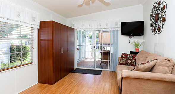 Den doubles as a third bedroom.  Murphy bed included!