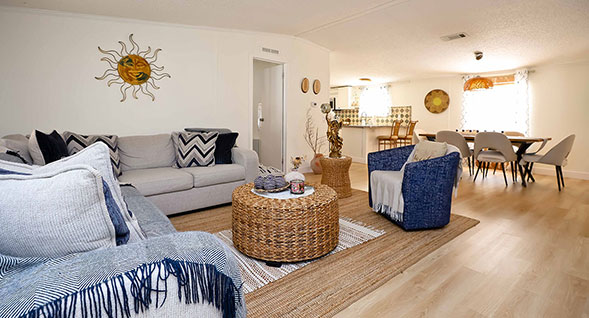 Gorgeous blond hardwood laminate flooring throughout and soft spanish white walls